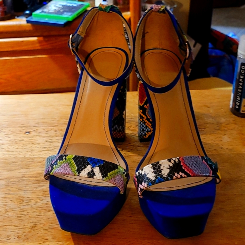 Snake skin heels with buckle straps